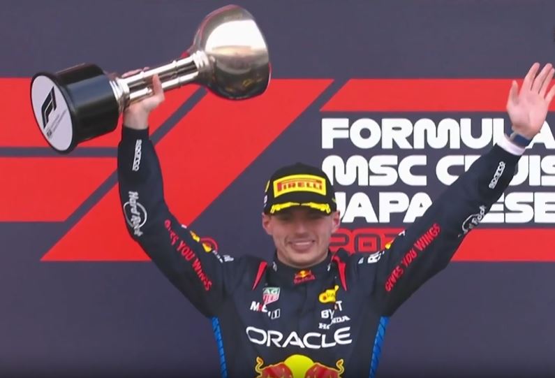 Verstappen wins in Japan after crash delay